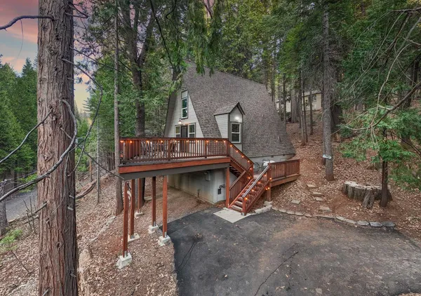 a view of house with outdoor seating space