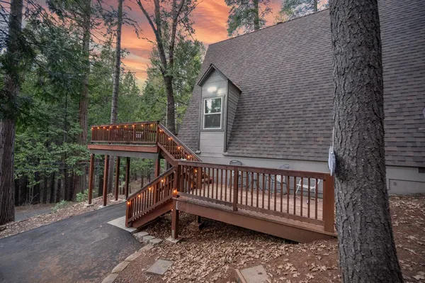 a view of a yard with an outdoor space