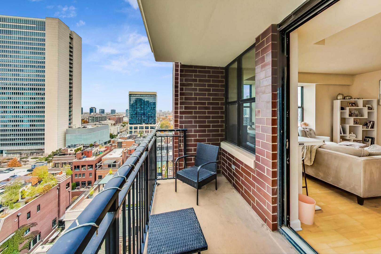 451 West Huron Street, Unit 1201 Chicago, IL 60654 - Photo 17 of 18 a balcony view with a couch