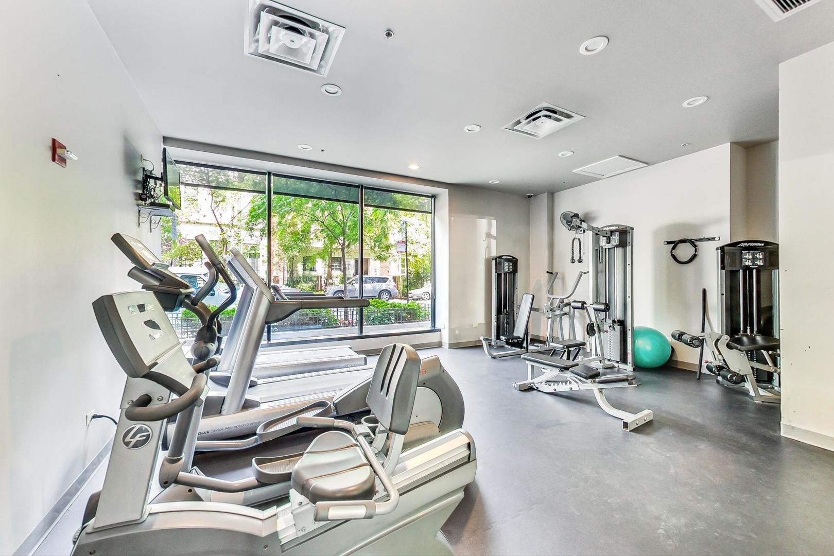 451 West Huron Street, Unit 1201 Chicago, IL 60654 - Photo 18 of 18 a view of a room with gym equipment