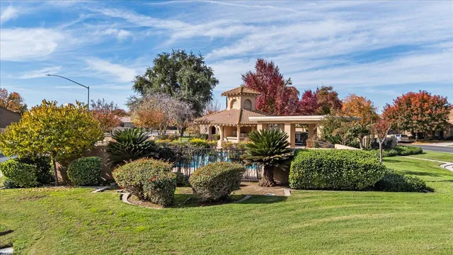 an aerial view of a house outdoor space and sitting kitchen