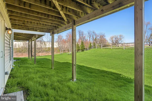 a view of a porch with a backyard