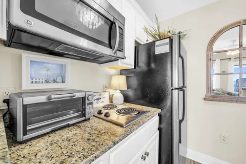 a view of a lake with a city