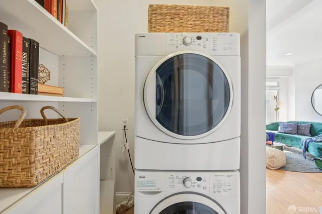 a view of livingroom with washer and dryer