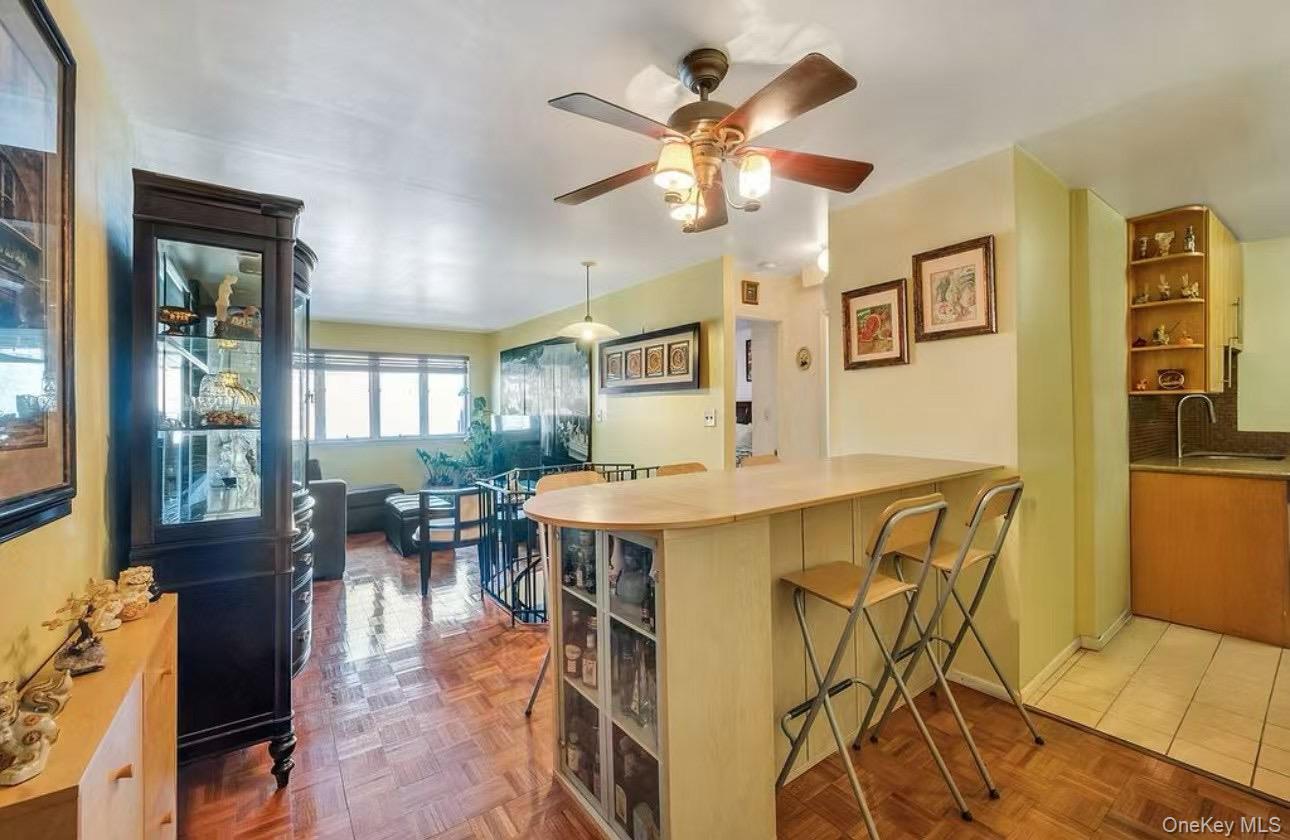 46-12 161 Street, Unit 1D Queens, NY 11358 - Photo 3 of 7 a view of a dining room with furniture window and outside view