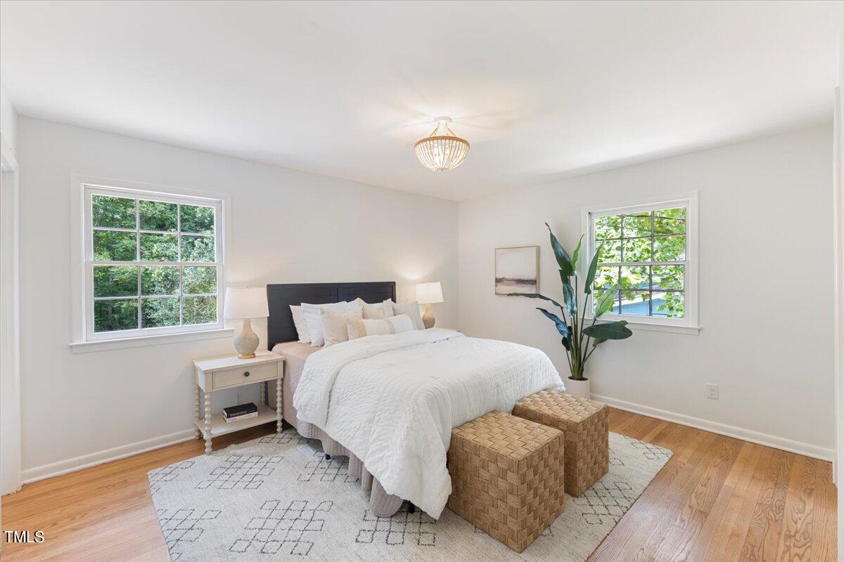 134 Radcliff Circle Durham, NC 27713 - Photo 16 of 37 a bedroom with a bed and a window
