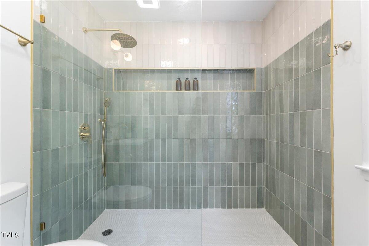 134 Radcliff Circle Durham, NC 27713 - Photo 21 of 37 a bathroom with a shower and a sink