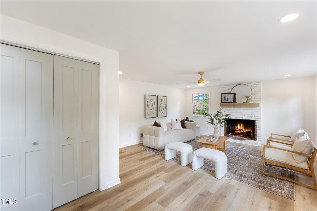 134 Radcliff Circle Durham, NC 27713 - Photo 28 of 37 a living room with furniture and a fireplace