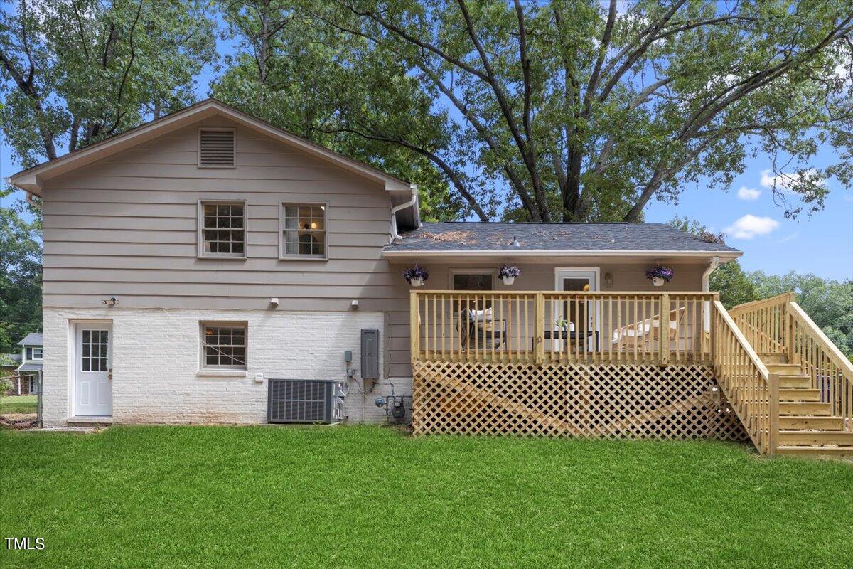 134 Radcliff Circle Durham, NC 27713 - Photo 36 of 37 a front view of a house with a garden
