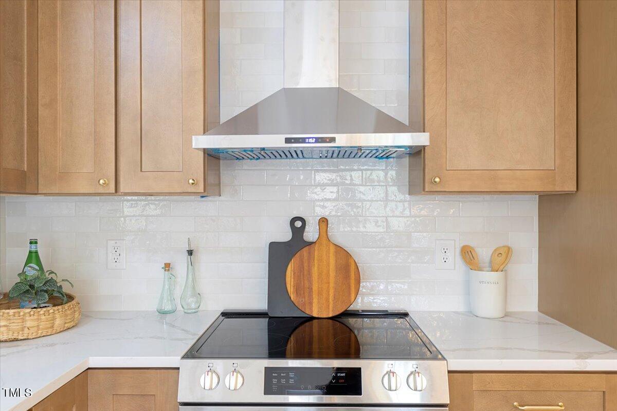 134 Radcliff Circle Durham, NC 27713 - Photo 10 of 37 a stove top oven sitting inside of a kitchen