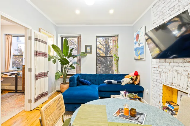 a kitchen with stainless steel appliances granite countertop a refrigerator a stove top oven a sink and dishwasher