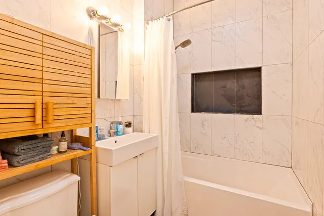 a bathroom with a sink and a bathtub