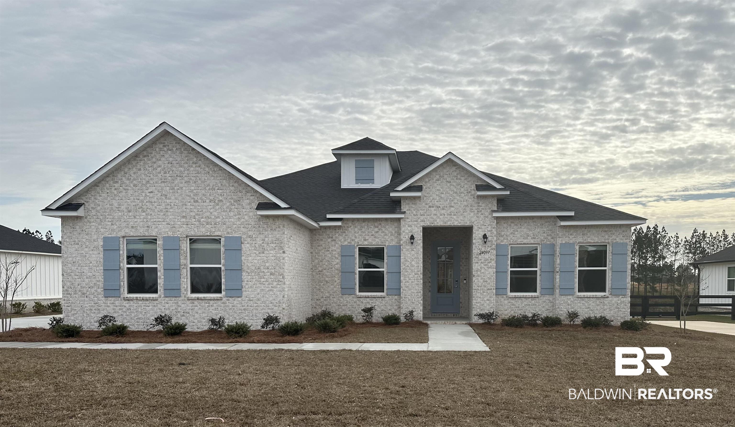 24097 Shadowridge Drive Daphne, AL 36526 - Photo 1 of 1 View of front of house featuring brick siding and roof with shingles