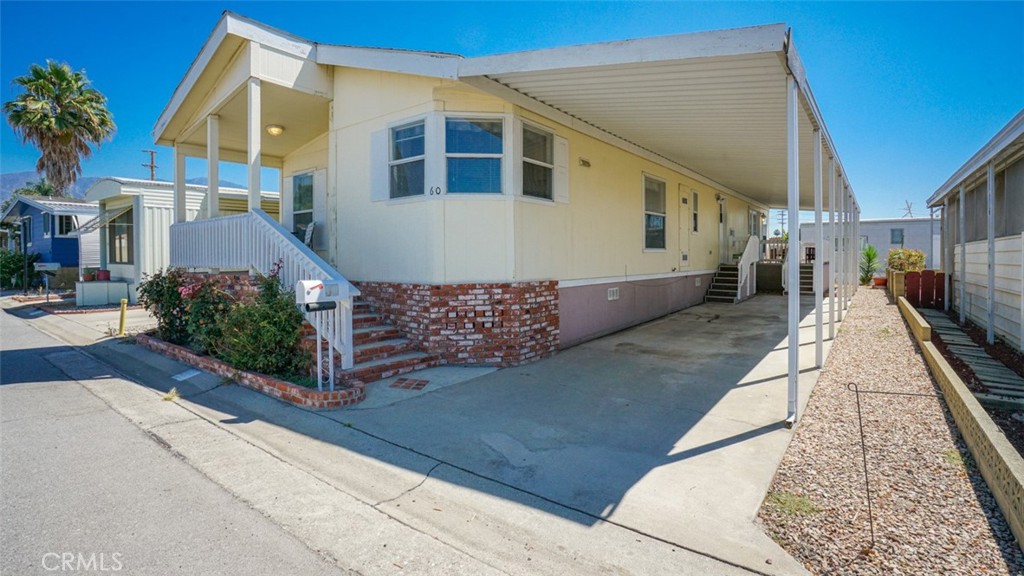 416 Jeffries, Unit 60 Monrovia, CA 91016 - Photo 2 of 49 a view of a house with a street