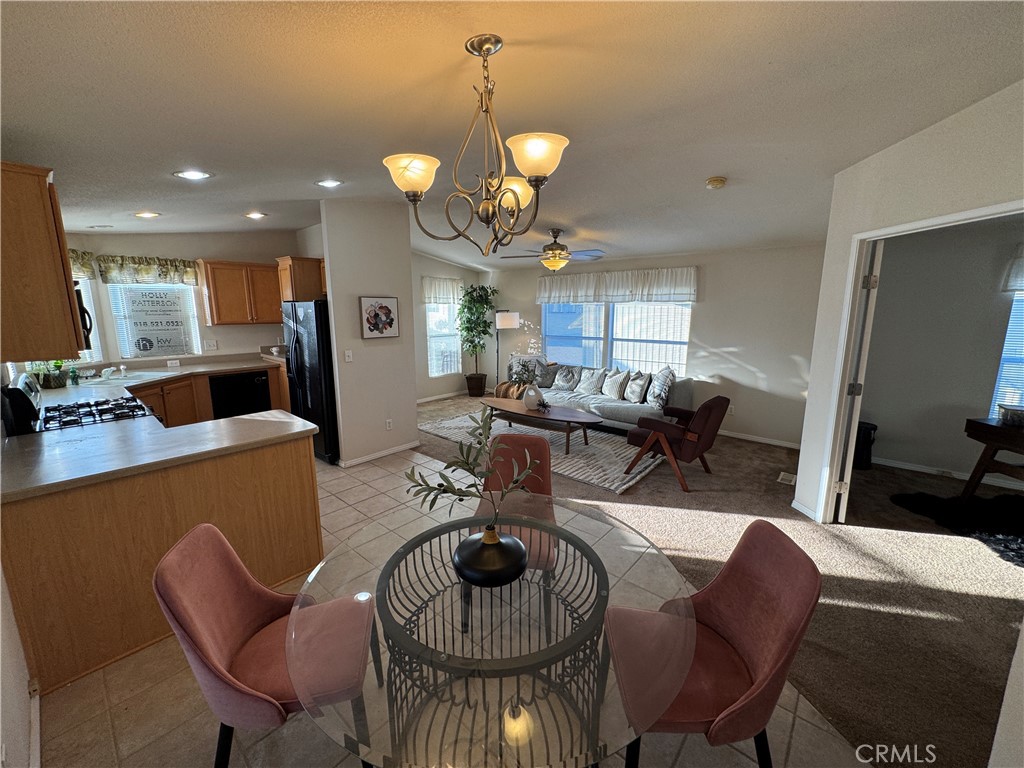 416 Jeffries, Unit 60 Monrovia, CA 91016 - Photo 24 of 49 a view of a dining room with furniture and wooden floor