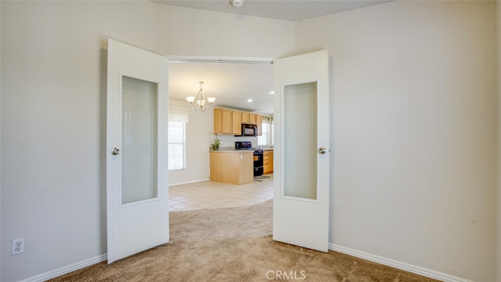 416 Jeffries, Unit 60 Monrovia, CA 91016 - Photo 25 of 49 a view of a kitchen with a refrigerator and a kitchen