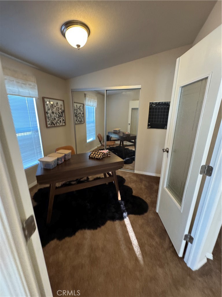 416 Jeffries, Unit 60 Monrovia, CA 91016 - Photo 27 of 49 a living room with furniture and a flat screen tv