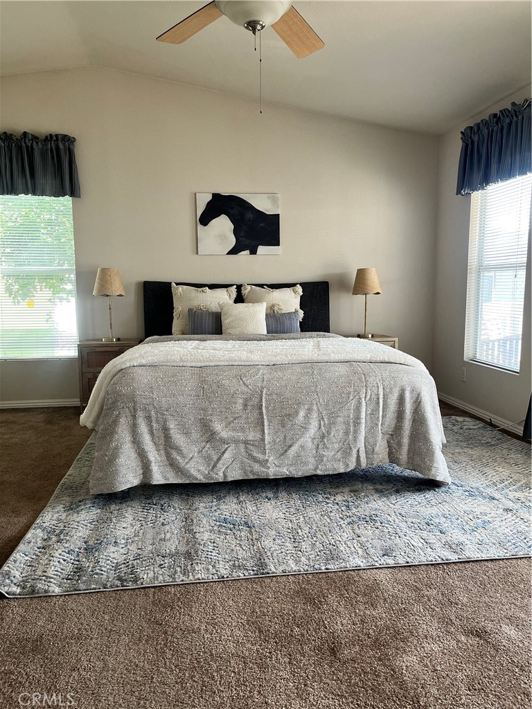 416 Jeffries, Unit 60 Monrovia, CA 91016 - Photo 30 of 49 a bedroom with a bed and a window