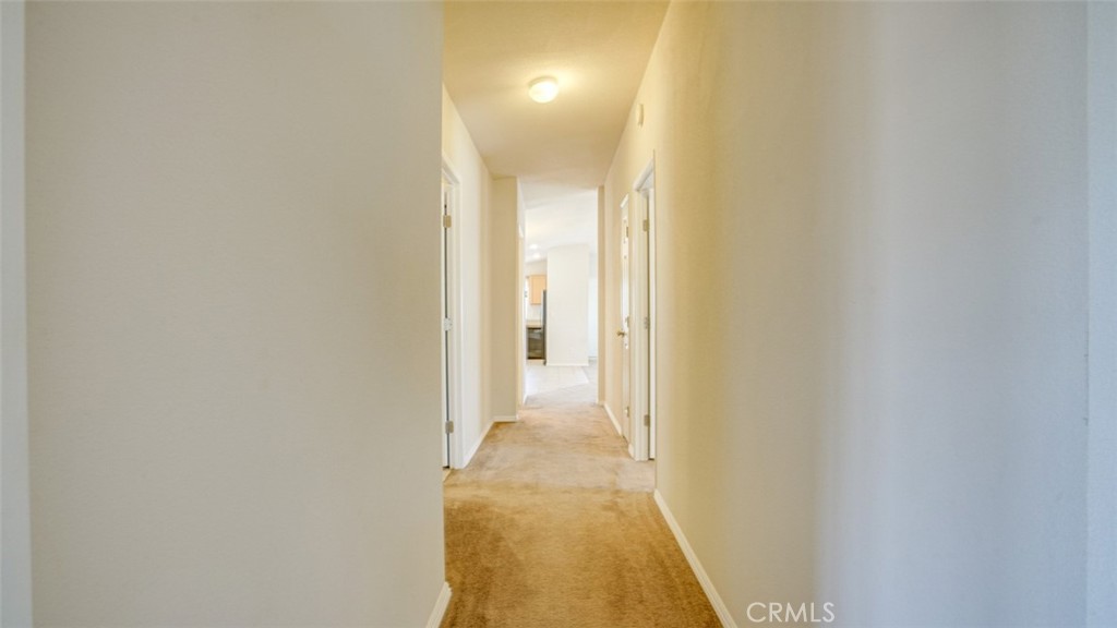 416 Jeffries, Unit 60 Monrovia, CA 91016 - Photo 46 of 49 a view of a hallway with wooden floor