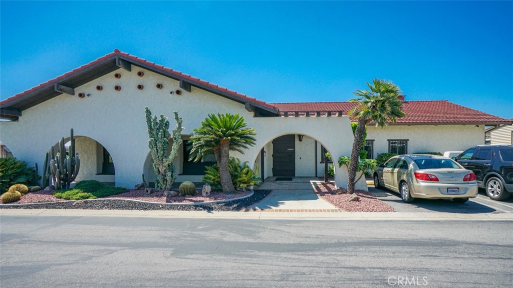 416 Jeffries, Unit 60 Monrovia, CA 91016 - Photo 47 of 49 a front view of a building with cars parked