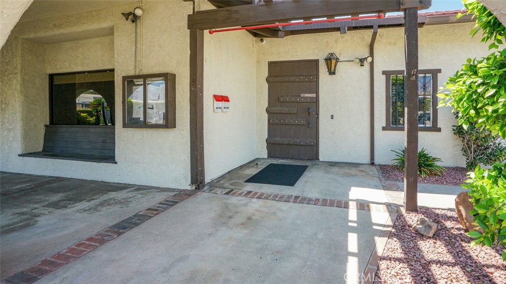 416 Jeffries, Unit 60 Monrovia, CA 91016 - Photo 48 of 49 a view of a house with a glass door