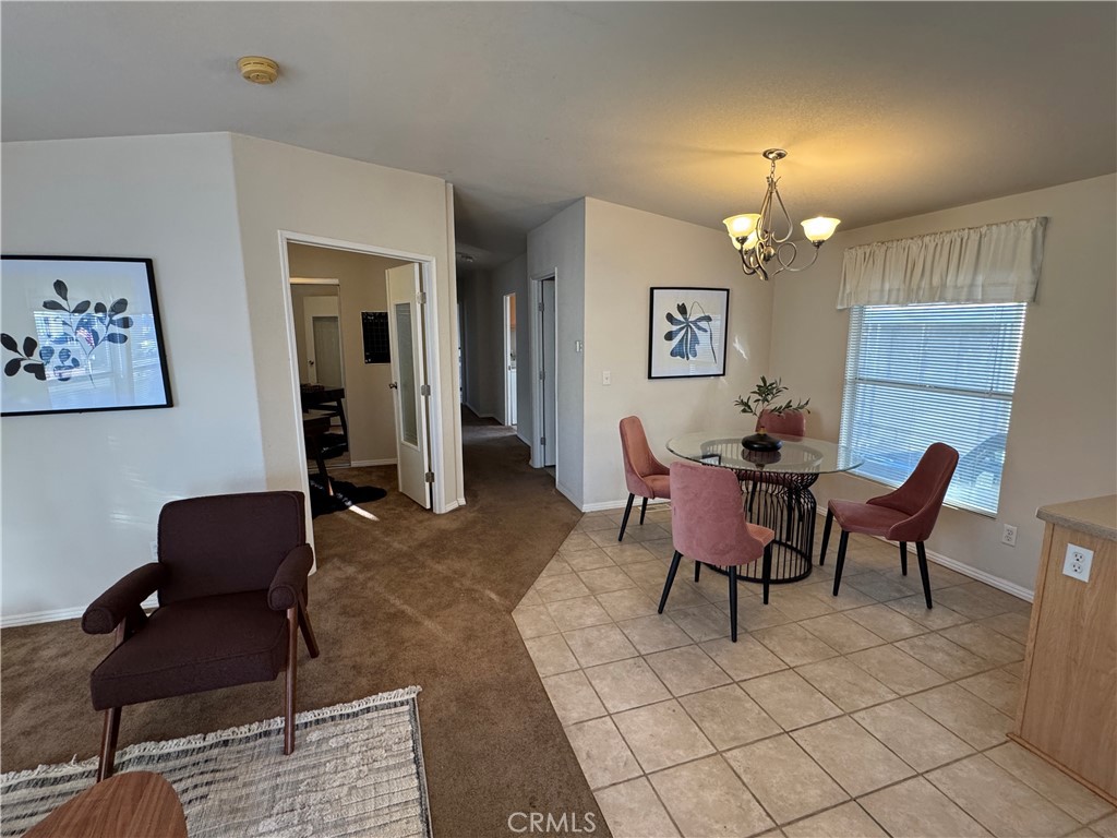 416 Jeffries, Unit 60 Monrovia, CA 91016 - Photo 6 of 49 a view of a livingroom and dining room