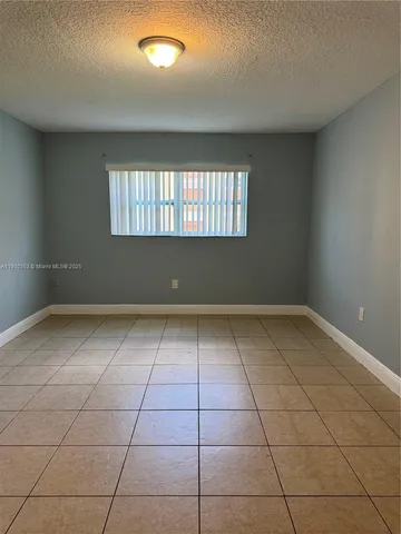 a view of a room with windows