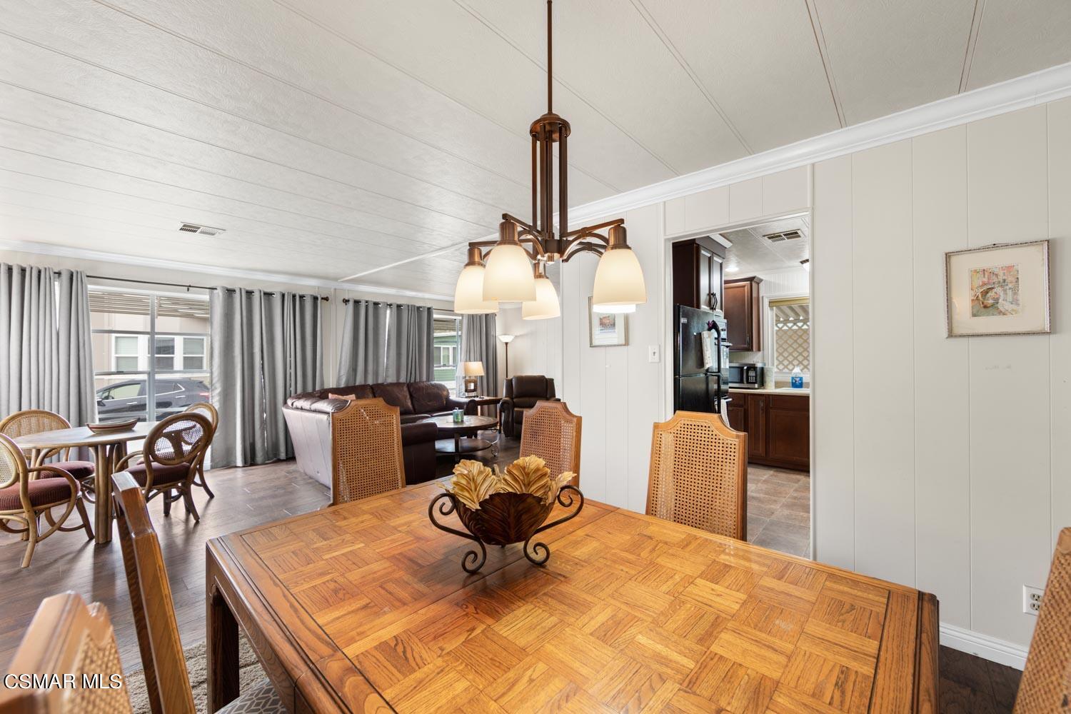 195 Tierra Rejada Road, Unit 157 Simi Valley, CA 93065 - Photo 11 of 27 a view of a dining room with furniture