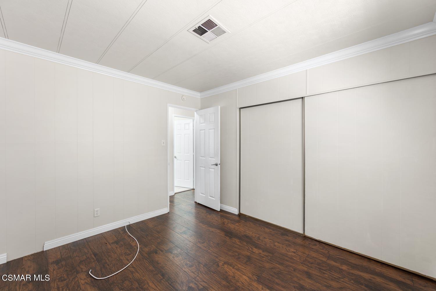 195 Tierra Rejada Road, Unit 157 Simi Valley, CA 93065 - Photo 20 of 27 a view of a room with wooden floor