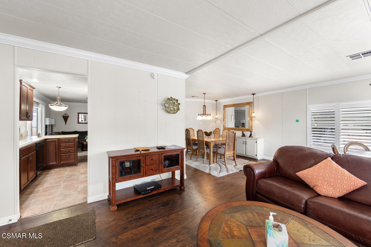 195 Tierra Rejada Road, Unit 157 Simi Valley, CA 93065 - Photo 9 of 27 a living room with furniture and a wooden floor