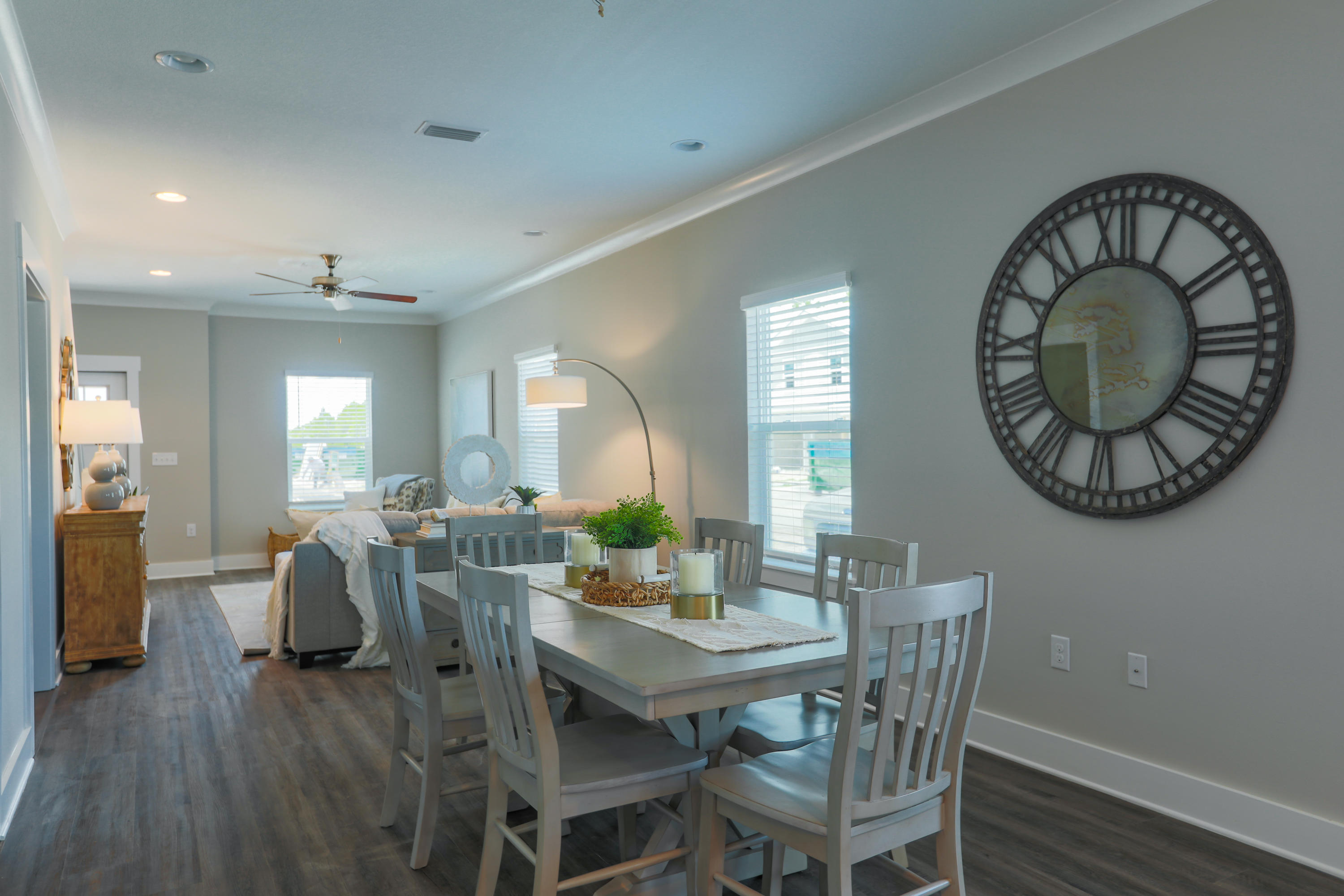302 North Sand Palm Road, Unit 150VISTA Freeport, FL 32439 - Photo 18 of 24 a view of a dining room with furniture window and wooden floor