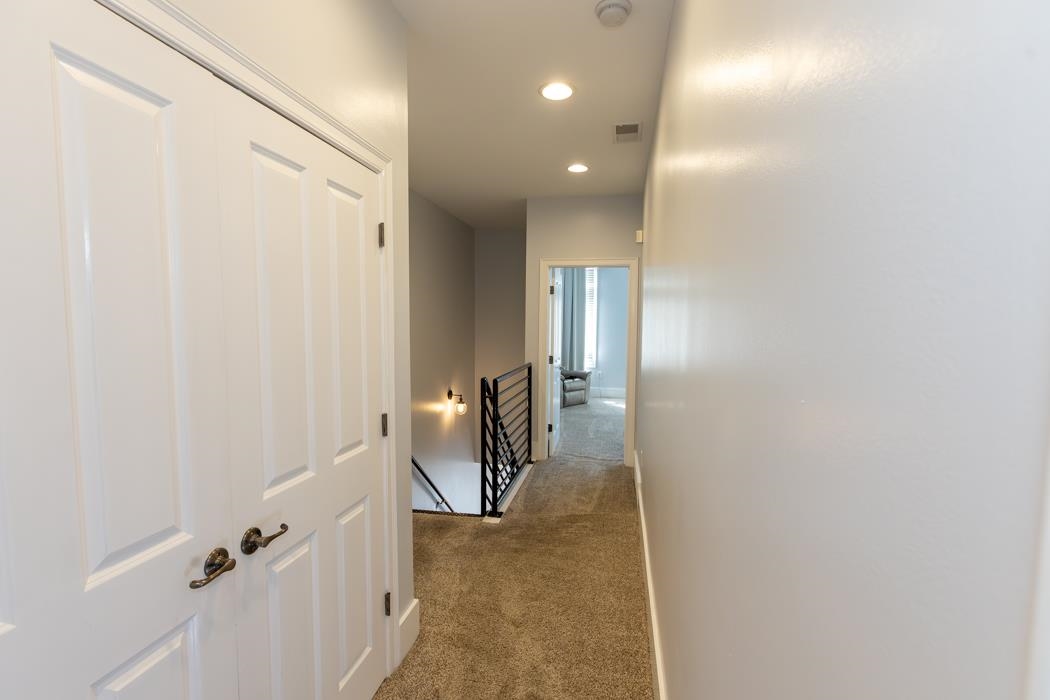 616 Denmark Drive, Unit 106 Memphis, TN 38103 - Photo 18 of 34 a view of a hallway with staircase