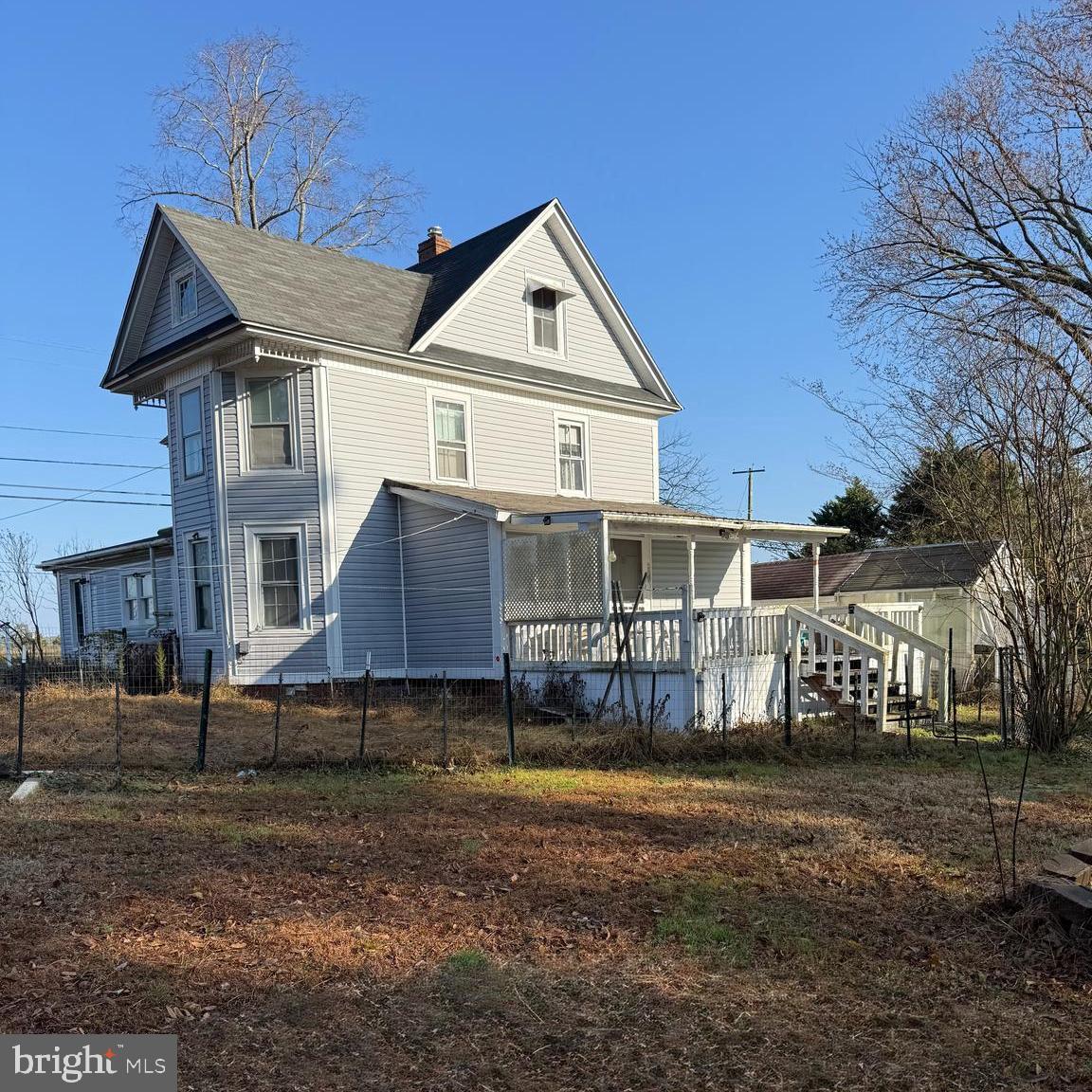 27239 Mt Vernon Road Princess Anne, MD 21853 - Photo 1 of 12 a front view of a house with a yard