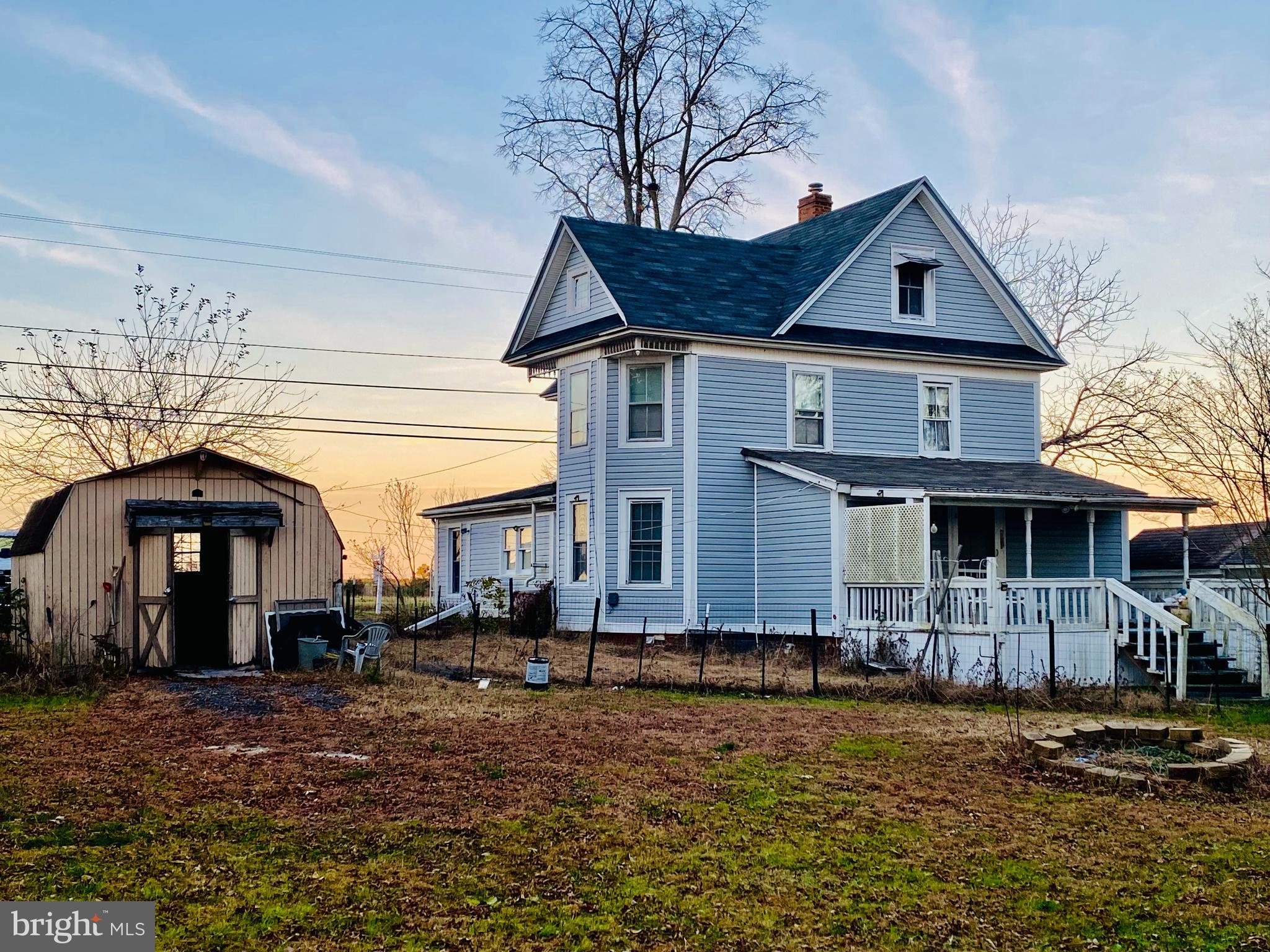 27239 Mt Vernon Road Princess Anne, MD 21853 - Photo 2 of 12 a front view of a house with garden