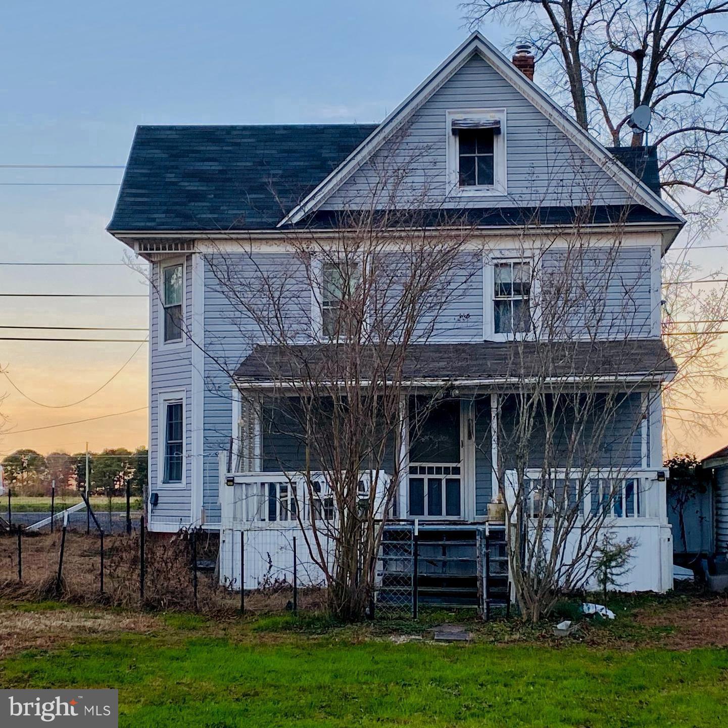 27239 Mt Vernon Road Princess Anne, MD 21853 - Photo 3 of 12 a front view of a house with garden