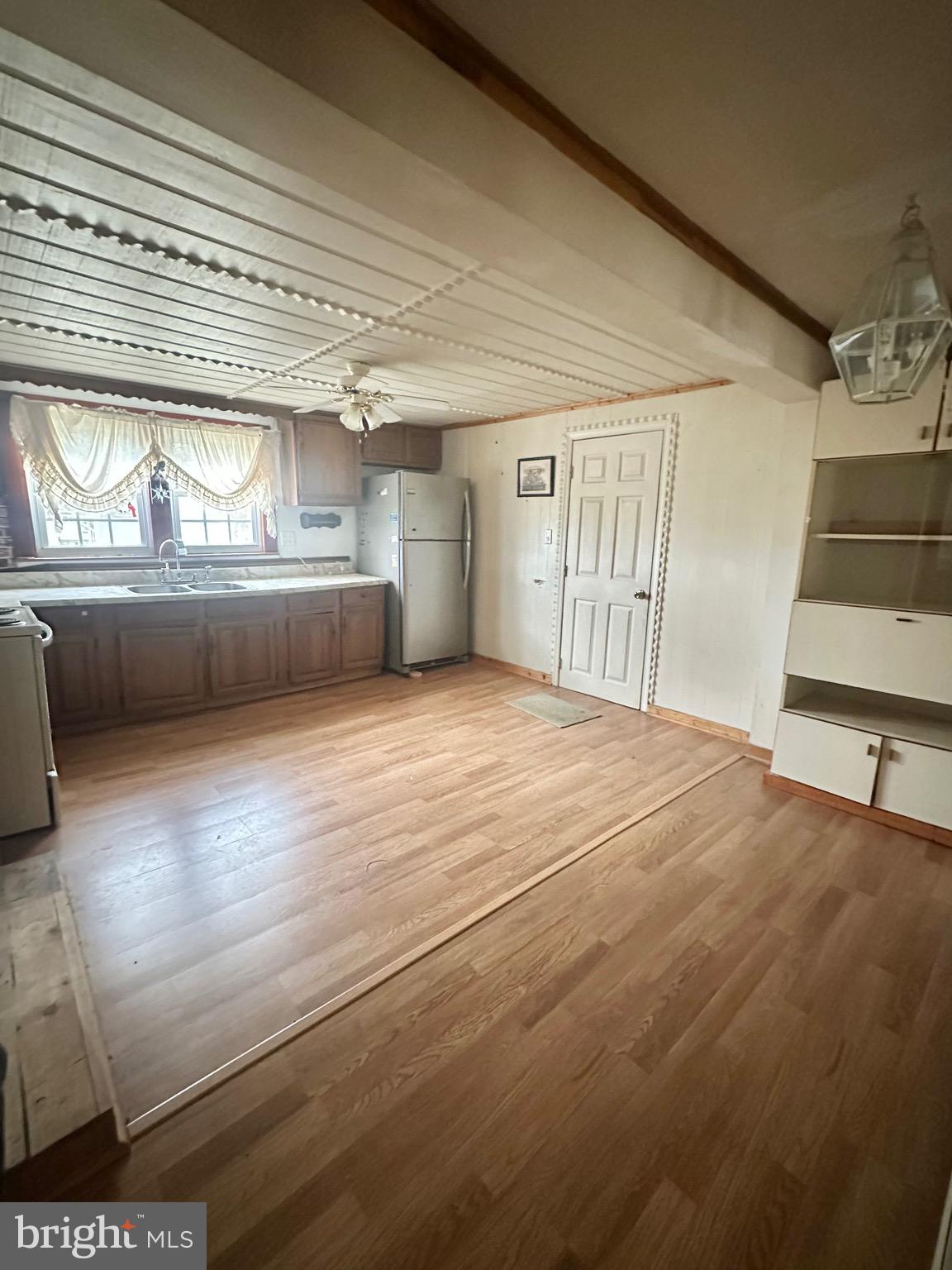 27239 Mt Vernon Road Princess Anne, MD 21853 - Photo 6 of 12 a view of empty room with wooden floor