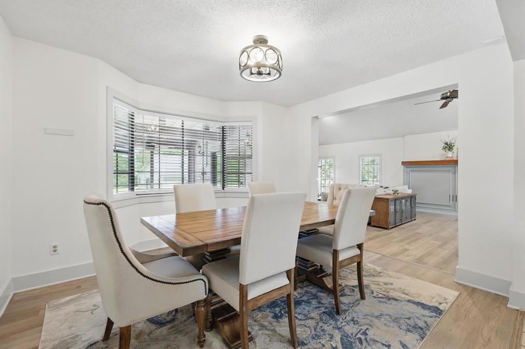 1189 West Jeter Road Bartonville, TX 76226 - Photo 11 of 40 a dining room with furniture and a window