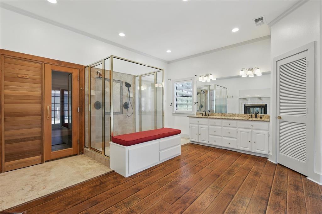 1189 West Jeter Road Bartonville, TX 76226 - Photo 15 of 40 a large spacious bathroom with a shower a sink and a mirror