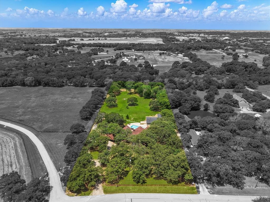 1189 West Jeter Road Bartonville, TX 76226 - Photo 2 of 40 Fully Fenced with an electric gated entrance!