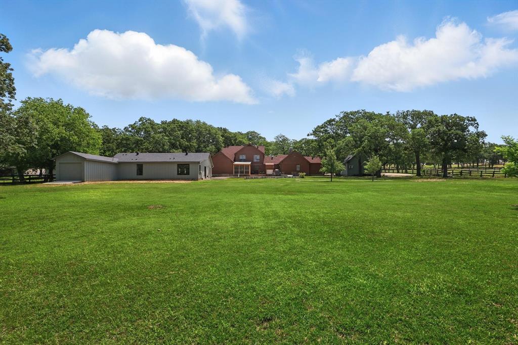 1189 West Jeter Road Bartonville, TX 76226 - Photo 25 of 40 a house view with a garden space