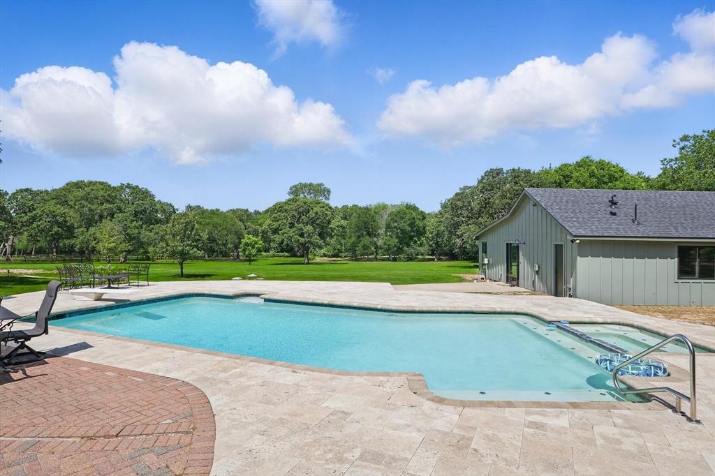 1189 West Jeter Road Bartonville, TX 76226 - Photo 6 of 40 a view of pool with yard in front of it