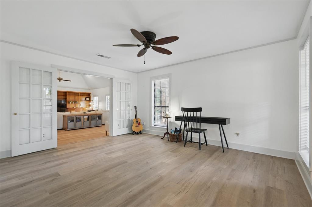 1189 West Jeter Road Bartonville, TX 76226 - Photo 10 of 40 a view of a livingroom with furniture and a ceiling fan