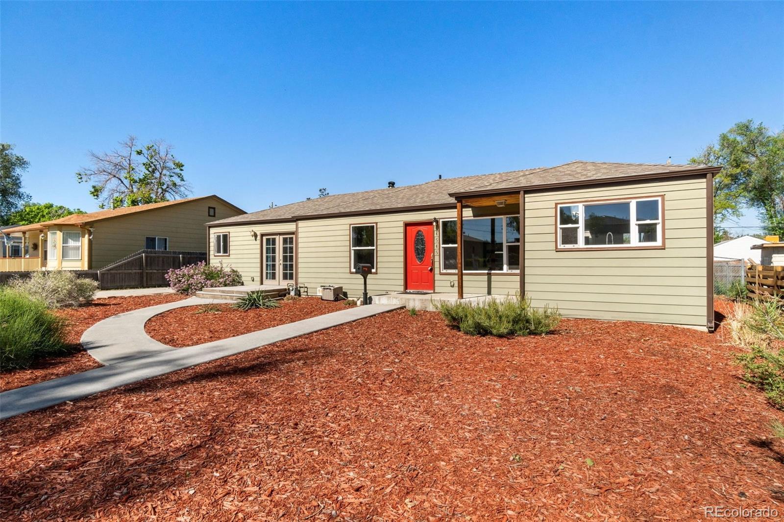 4545 Ingalls Street Wheat Ridge, CO 80033 - Photo 4 of 30 a front view of house with yard and green space