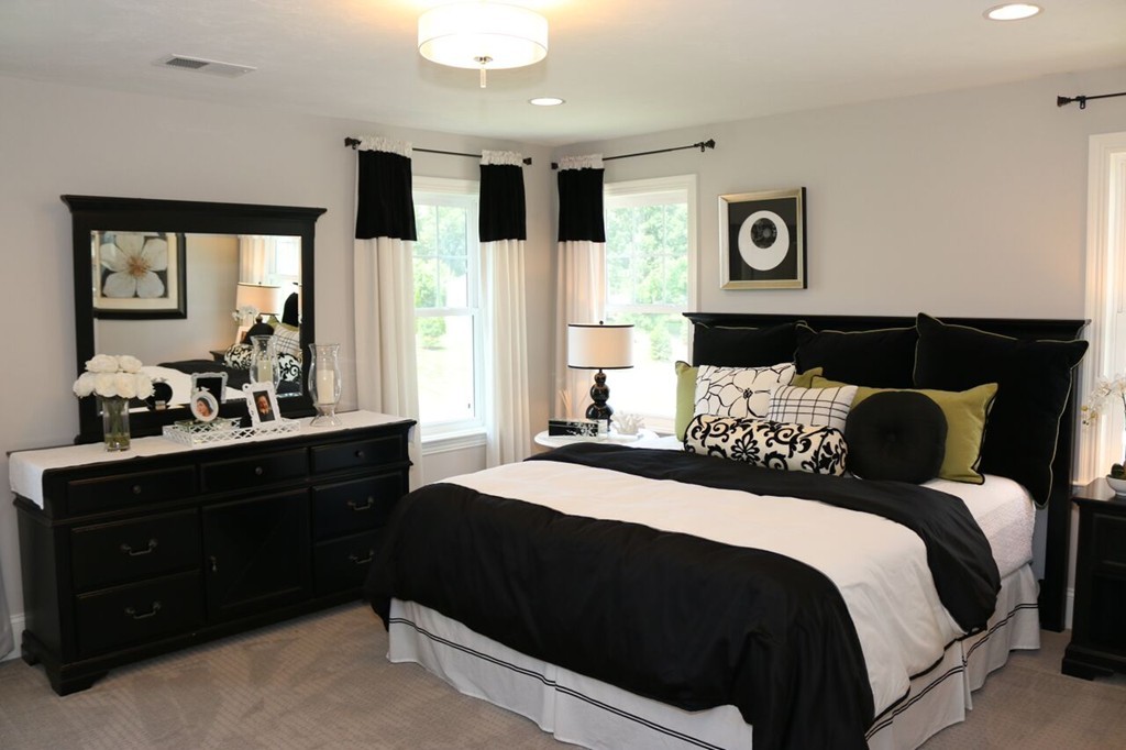 29 Brookview Road Franklin, MA 02038 - Photo 11 of 12 a bedroom with a bed and a dresser