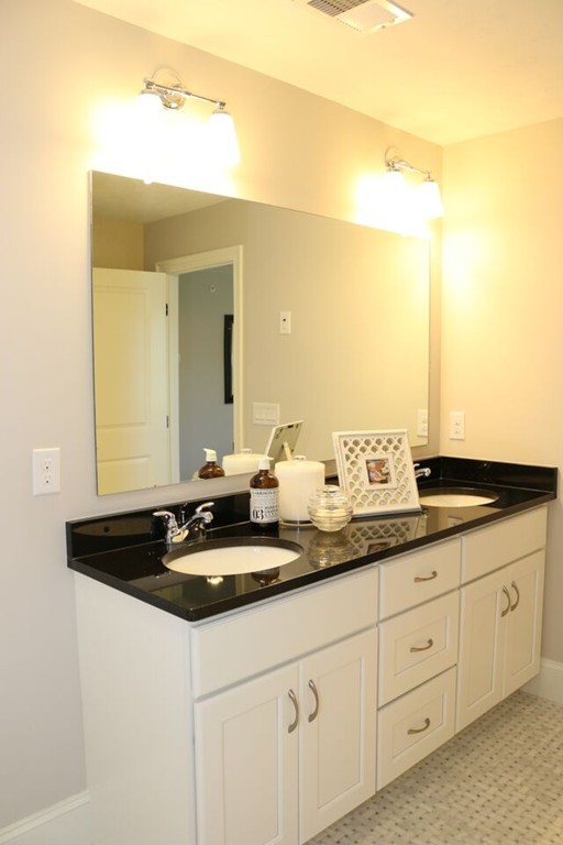 29 Brookview Road Franklin, MA 02038 - Photo 12 of 12 a bathroom with a granite countertop sink and a mirror