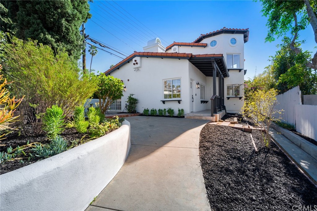 101 Esplanade San Clemente, CA 92672 - Photo 2 of 54 a front view of a house with a yard