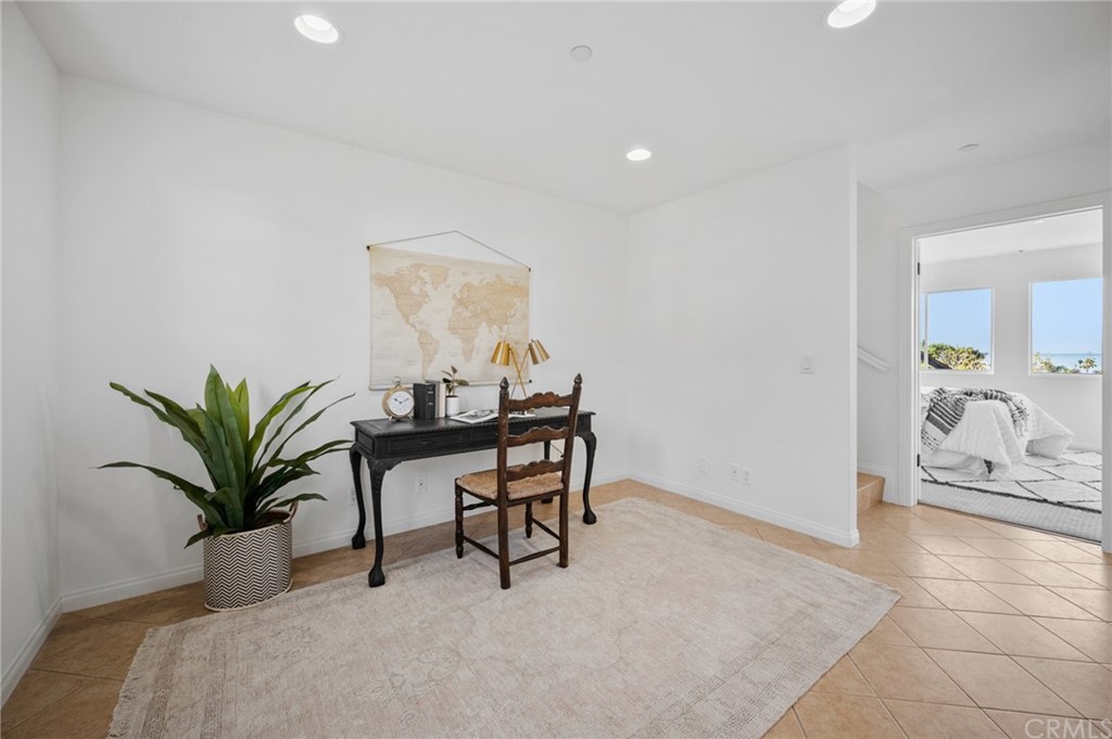 101 Esplanade San Clemente, CA 92672 - Photo 20 of 54 a workspace with furniture and potted plant