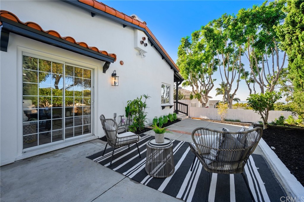 101 Esplanade San Clemente, CA 92672 - Photo 3 of 54 a view of balcony with two chairs and a potted plant
