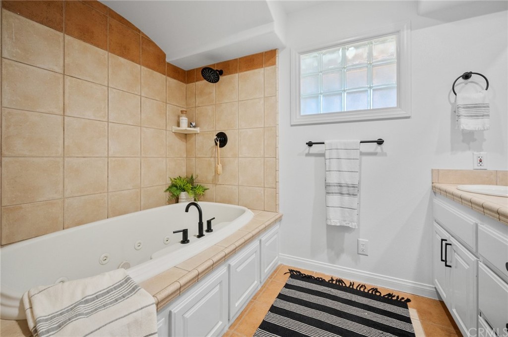 101 Esplanade San Clemente, CA 92672 - Photo 27 of 54 a bathroom with a bathtub and shower