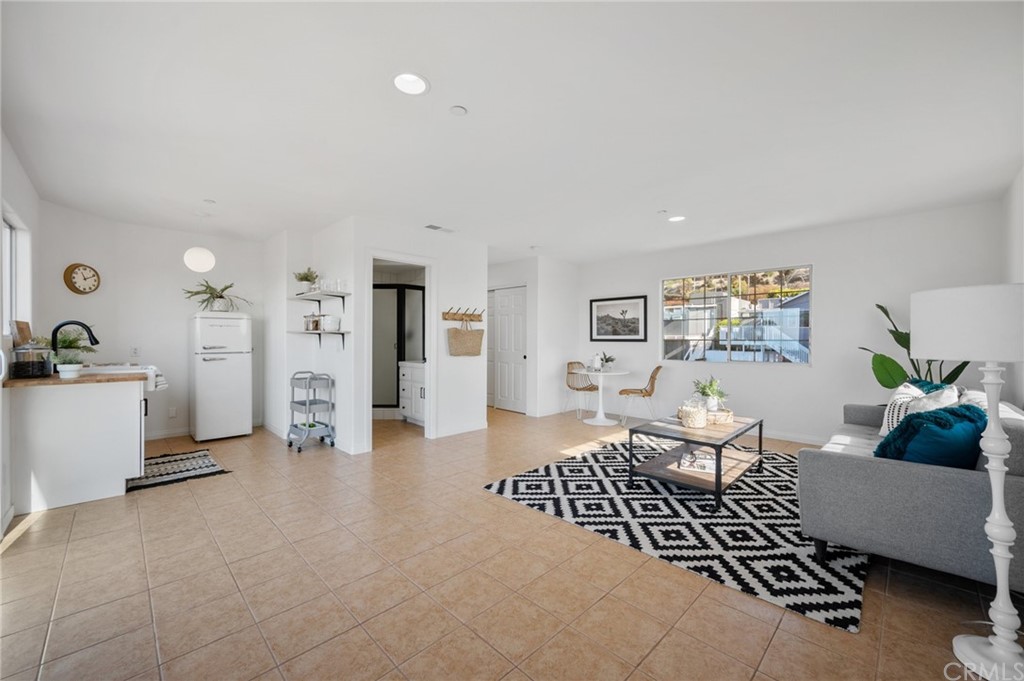 101 Esplanade San Clemente, CA 92672 - Photo 30 of 54 a living room with furniture and wooden floor